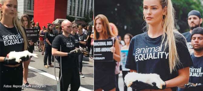 Segurando coelho morto na Av. Paulista, Yasmin Brunet pede o fim da exploração de animais